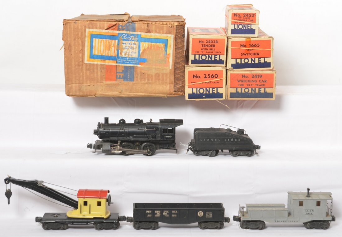 Lionel 1407B switcher freight outfit in OB 1665/2403B: Postwar Lionel O gauge 1407B switcher freight outfit in original boxes with 1665 steam switcher and 2403B bell ringing slopeback tender, 2452X Pennsylvania gondola, 2560 operating work crane, and 2419