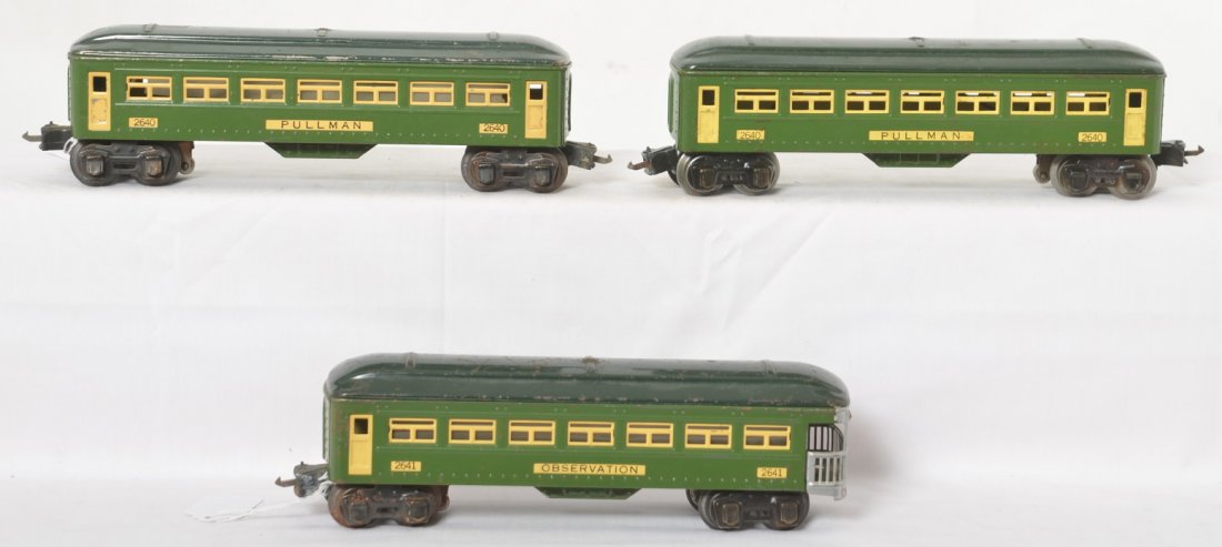 Lionel 2640, 2640, 2641 two tone green passenger cars: Prewar Lionel O gauge two-tone green passenger cars, two 2640 Pullman coaches, and 2641 observation with some rust on some frames and truck assemblies, C6.