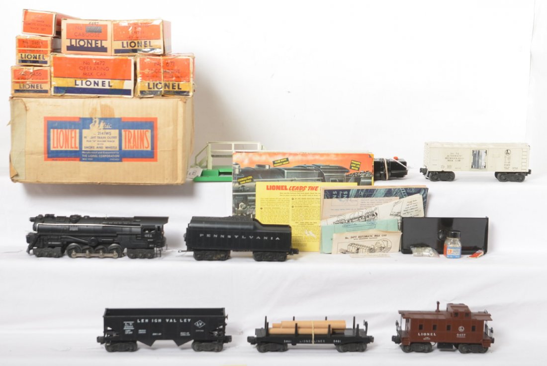 Lionel 2141WS 671/2671W steam freight set in OB: Postwar Lionel O gauge 2141WS steam freight set with 671 steam locomotive and 2671W Pennsylvania whistle tender, 3461X automatic lumber car, 6456 LV hopper, 3472 milk car (one chipped mounting hole) w