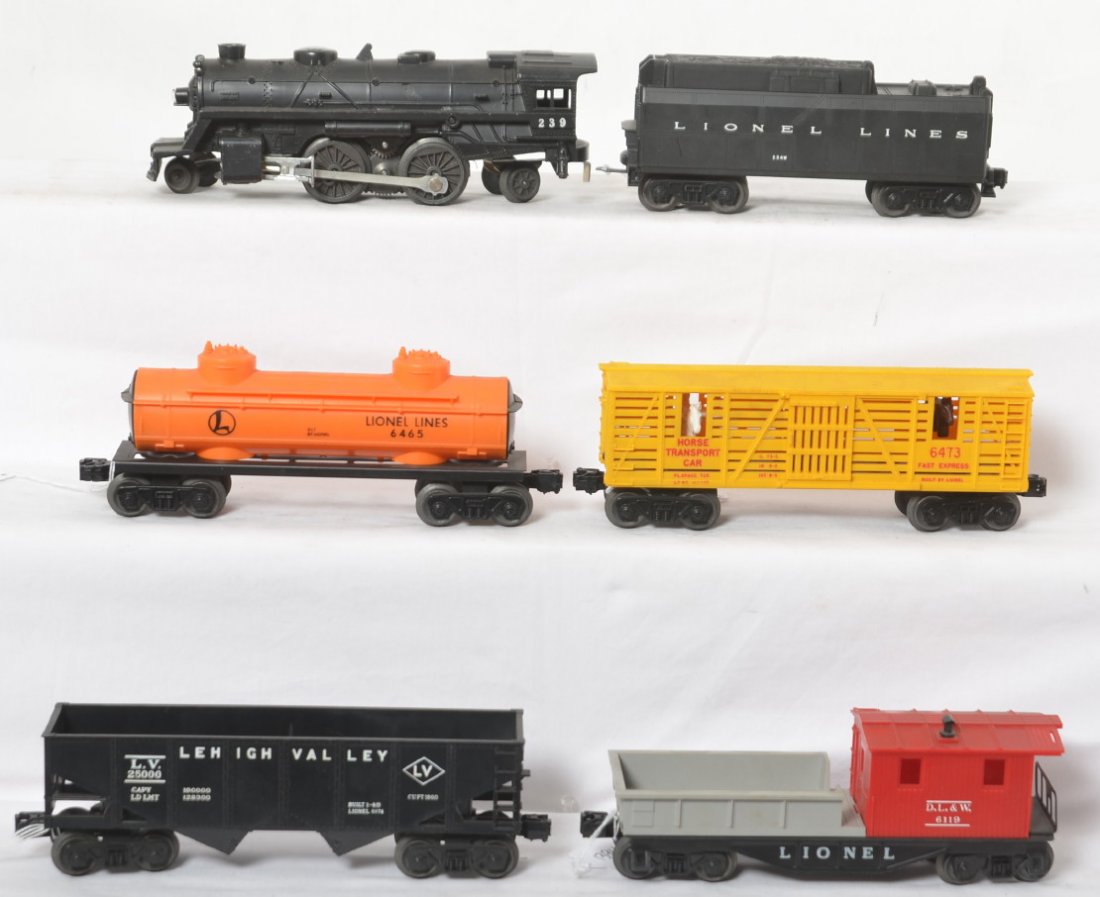 Lionel 239, 234W, 6465, 6473, 6076, 6119 steam freight: Postwar Lionel O gauge steam freight set, 239 loco, 234W whistle tender, 6465 LL tank, 6473 Horse Transport, 6076 LV hopper, and 6119 D.L.&W. work caboose. Trains look nicer C6-7.