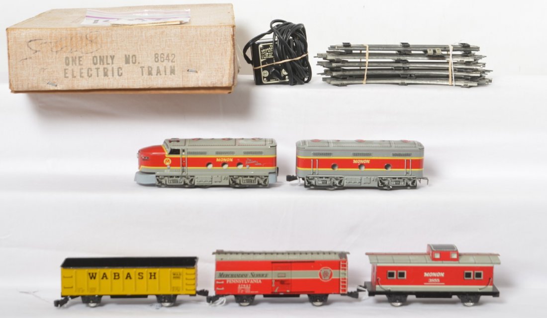 Marx 8642 Monon diesel freight set in OB: Postwar Marx O gauge 8642 Monon diesel freight set in original box with track and transformer. Trains are: 81F Alco diesel A unit, diesel B unit, 80982 Wabash high side gondola, 37957/1427 PRR Pennsyl