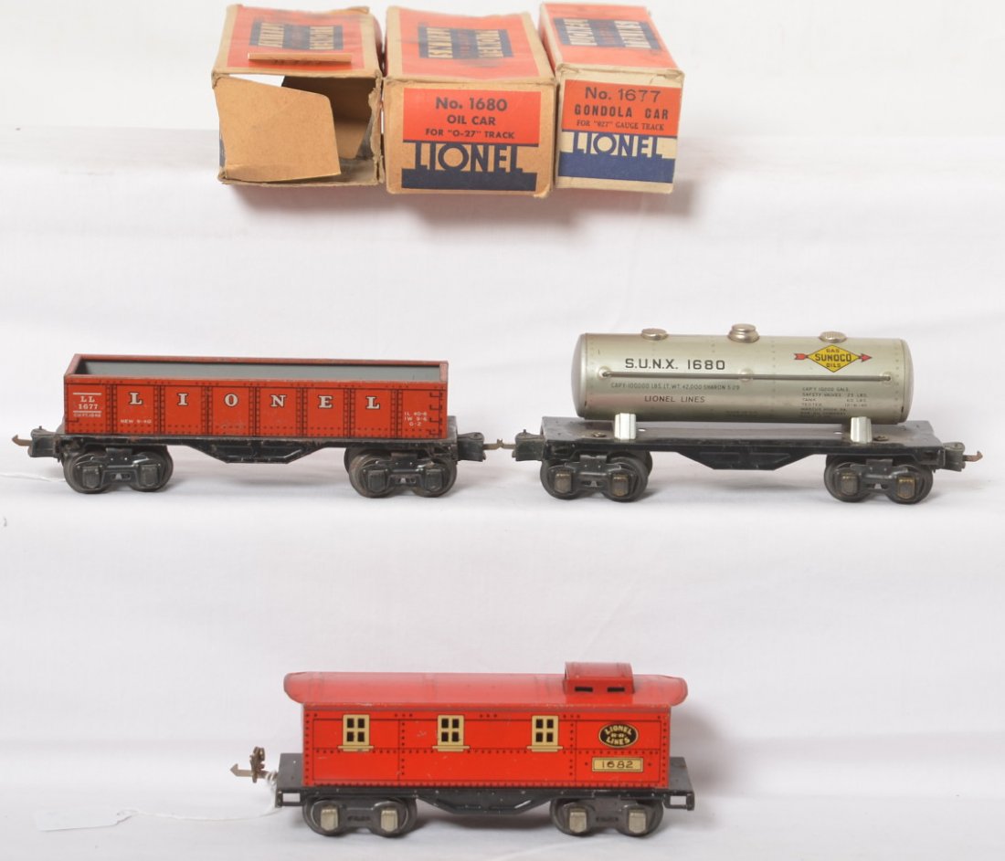 Lionel 1677, 1680, 1682 freight cars in OB: Prewar Lionel O gauge freight cars in original boxes, 1677 gondola, 1680 Sunoco oil car, and 1682 caboose, trains look C6. Boxes have missing flaps.