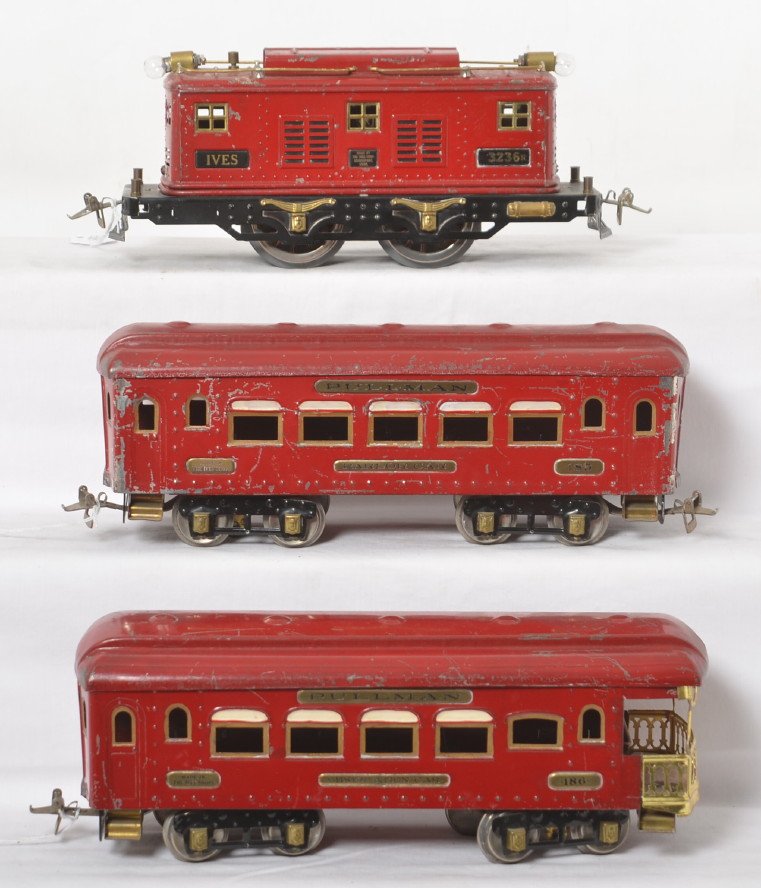 Ives 1010 wide gauge Red electric passenger set in OB: Prewar Ives wide/standard gauge 1010 Electric Train for 2-1/4 Ga. Track in original box. Set is comprised of 3236R boxcab electric locomotive with 185 Pullman Parlor car, and 186 Pullman observation c