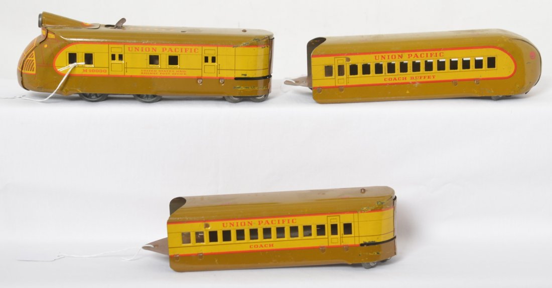 Marx O ga. U.P. M-10000 Diesel passenger mech. litho: Prewar Marx O gauge Union Pacific M-10000 Diesel passenger lithographed tinplate mechanical windup three unit train with key. Very nice looking train, better C6.