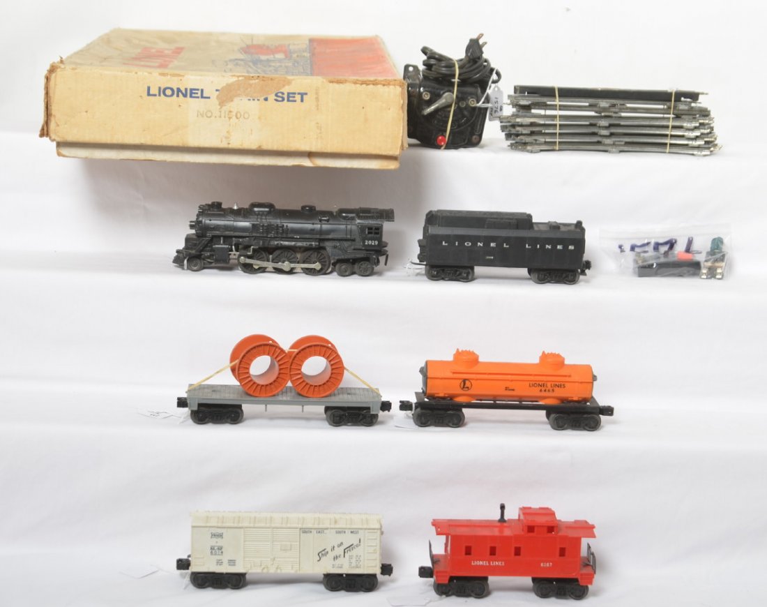 Lionel 11500 steam freight set in original box: Postwar Lionel O gauge 11500 steam freight set in original box. Set is comprised of: 2029 steam locomotive and 234W whistle tender with 6014 Frisco boxcar, 6406 General-type flatcar w/two cable reels,