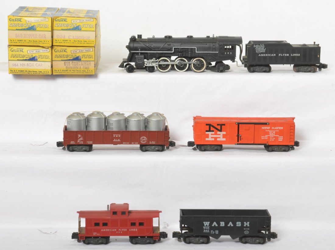 American Flyer 293 w/916, 940, 984, 904 w/car boxes: Postwar American Flyer S gauge 293 NYNH&HR steam locomotive and tender with 916 Delaware and Hudson gondola with canisters, 940 Wabash hopper, 984 New Haven boxcar, and 904 caboose. Trains should clea