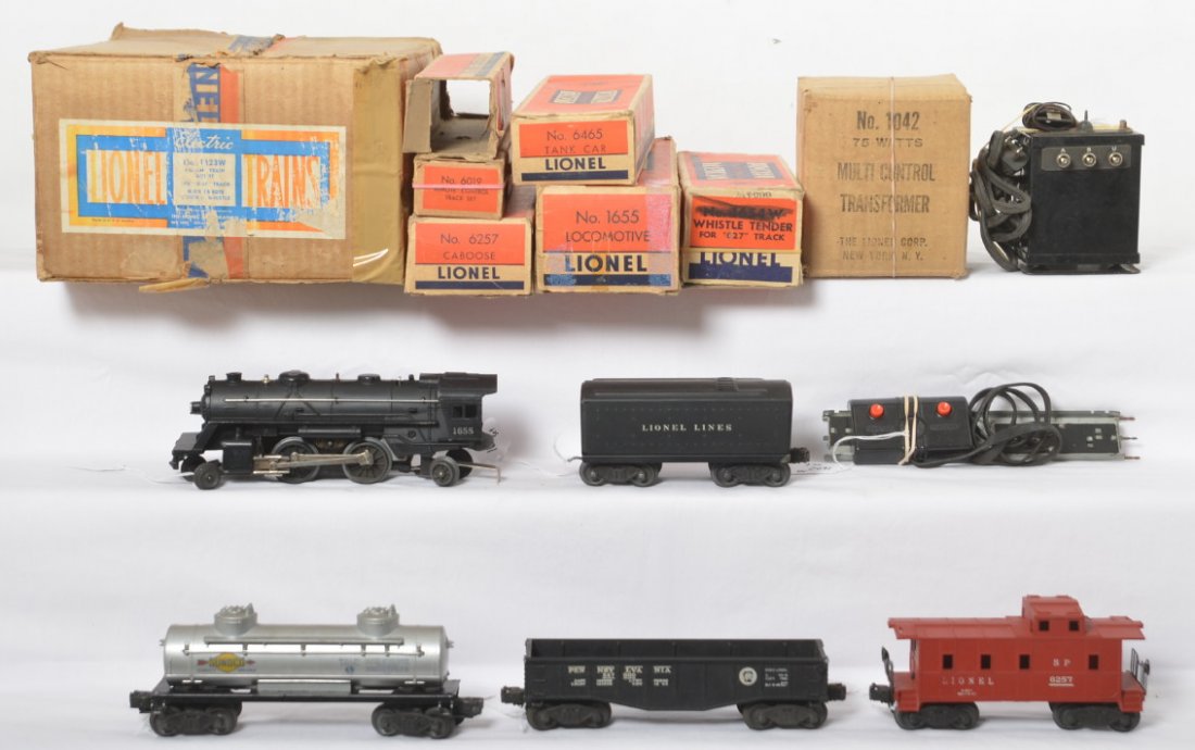 Lionel 1123W freight train with R.C. whistle in OB: Postwar Lionel O gauge 1123W Freight Train Outfit with Remote Control Whistle in original boxes with 1655 steam locomotive and 1654W whistle tender, 6452 Pennsylvania gondola, 6465 Sunoco tank, 6257 S