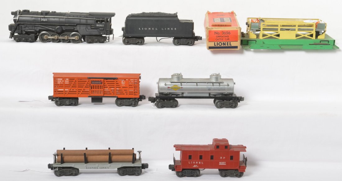 Lionel 2020/6020W, 3656 Armour, 6411, 6465, 6357: Postwar Lionel O gauge 2020 steam locomotive, 6020W whistle tender, 3656 Armour cattle car with original box missing flaps, 6411 lumber, 6465 Sunoco tank, and 6357 Southern Pacific caboose, trains sho