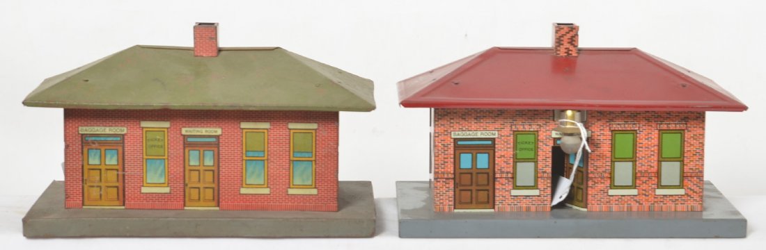 Two American Flyer No. 96 Flyer Town-Stations: Prewar American Flyer, Flyer Town-Station No. 96 waiting room, two variations. One has light surface rust, C6. Other is cleaner, shinier, and illuminated, C6-7.