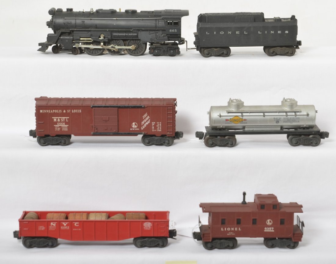 Lionel 665 Hudson, 6026W, 6464-50, 6462, 6465, 6457: Lionel postwar O gauge set with 665 steam Hudson, 6026W whistle tender, 6464-50 MStL boxcar, 6462 red NYC gondola, 6465 tank car and a 6357 lighted caboose. The trains are C6-7 although the caboose do