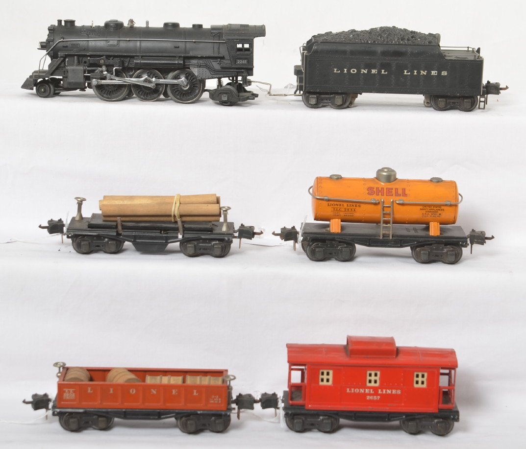 Lionel 224E, 2224W, 2652, 3651, 2654, 2657: Lionel prewar O gauge set with 224E steam loco, 2224W die cast tender, 2652 orange gondola, 3651 dump car, 2654 Shell tank car and a 2657 caboose. Trains are C6-7.