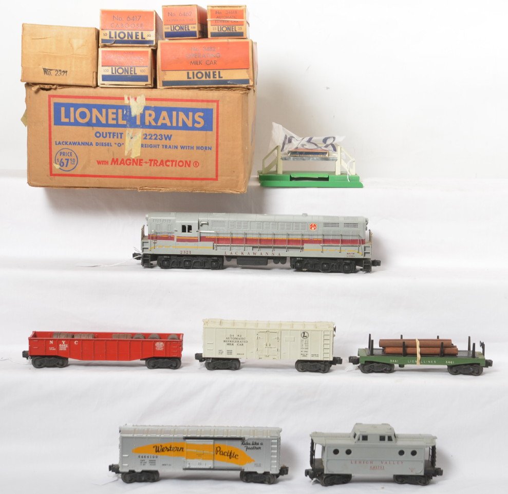 Lionel 2223W Lackawanna diesel freight set in OB: Postwar Lionel O gauge 2223W Lackawanna FM Trainmaster diesel freight set in original box, 2321 diesel loco, 3461X-25 lumber, 3482 milk car, 6462-100 NYC gondola, 6464-100 Western Pacific boxcar, and