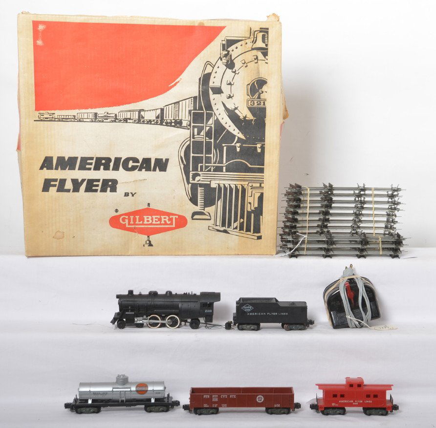 American Flyer 20123 steam freight set in OB: Postwar American Flyer S gauge 20123 steam freight train set with 21160 Reading Lines steam loco and tender with 24309 Gulf tank, 24106 Pennsylvania sandcar, and 24603 caboose. Much nicer C6+ looking