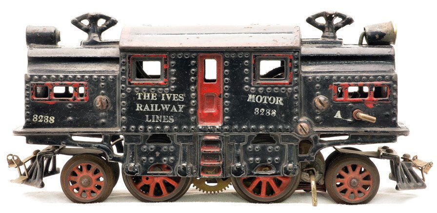 Ives 3238 Black Cast Iron Electric Loco: Ives prewar O gauge 3238 black cast iron electric loco with silver rubber-stamping and red outline on roof. The cab roof and top of engine have been repainted. The rest of the loco is C6.