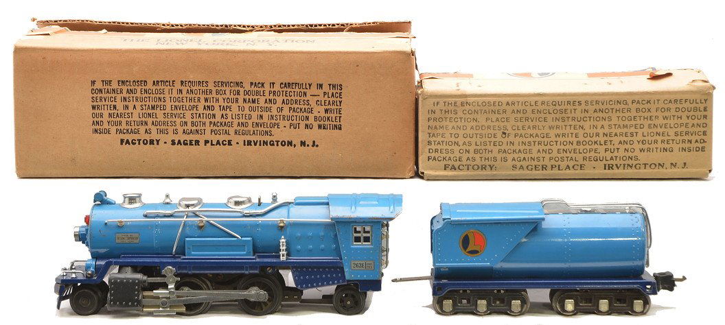 Lionel Blue Comet 263E with 2263W Tender OBs: Lionel prewar O gauge blue comet 263E steam loco and 2263W tender with nickel trim in OBs. The loco has a black repainted steam chest. The rest of the loco is C7. One hand rail is missing both stanchi