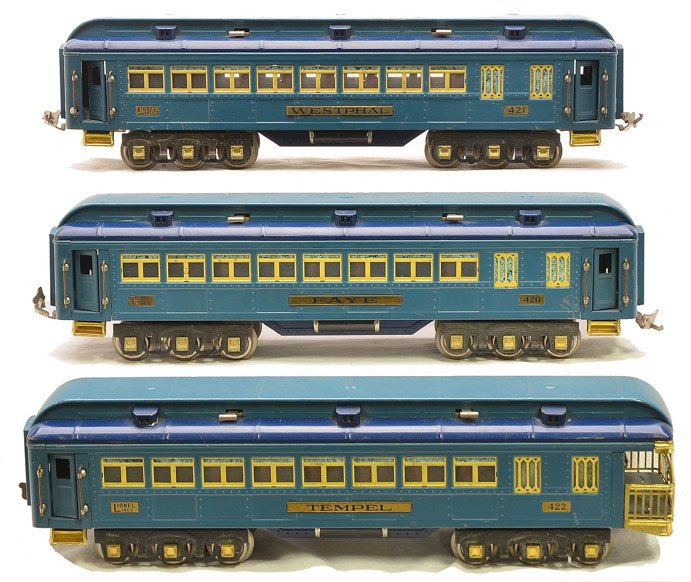 Lionel Blue Comet Passenger Cars 420 421 422: Lionel prewar standard gauge Blue Comet passenger cars with cream inserts and brass trim including; 420 Faye Pullman, 421 Westphal Pullman and a 422 Tempel observation. The 422 car has brass journals