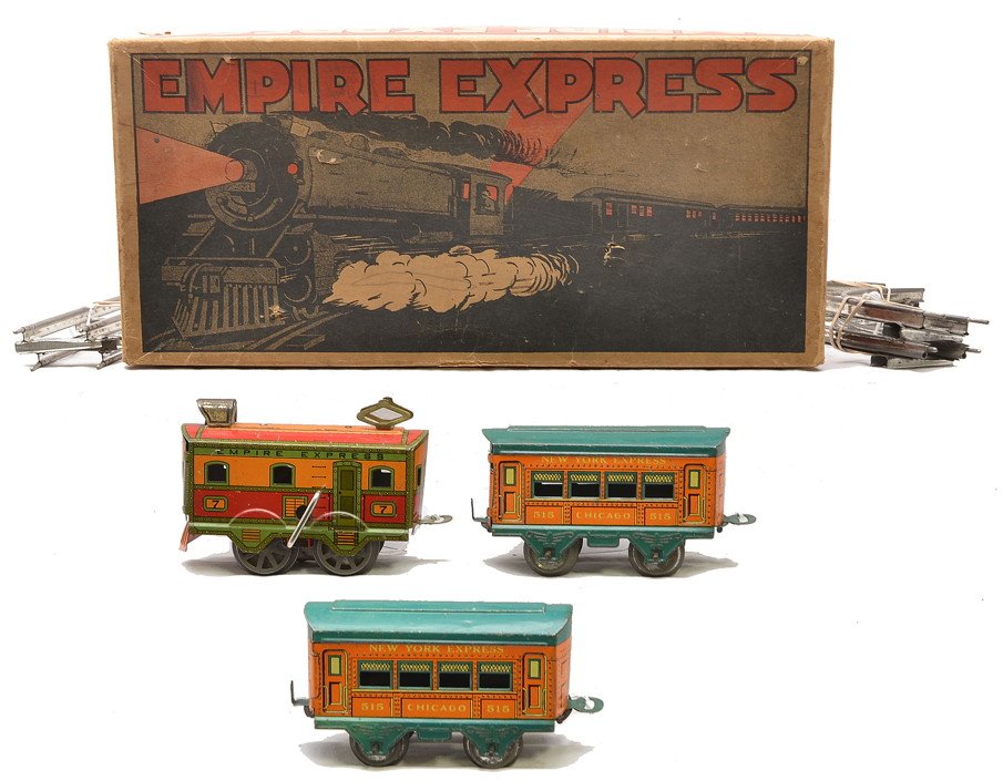 Am Flyer Empire Express Litho Passenger Set OB: American Flyer prewar O gauge Empire Express lithographed passenger set in OB including; no. 7 red/green/orange clockwork electric loco, two 515 four-wheel orange/blue-green New York Express Chicago c