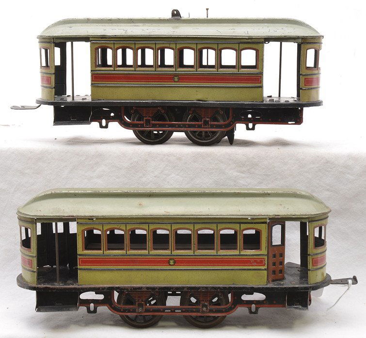 Gunthermann Clockwork Power & Trailer Trolley: Guntermann prewar German tin lithographed clockwork trolley with a non-power trailer trolley. Both trolleys are marked SG on the sides which stands for Sam Gunthermann. The powered trolley is missing