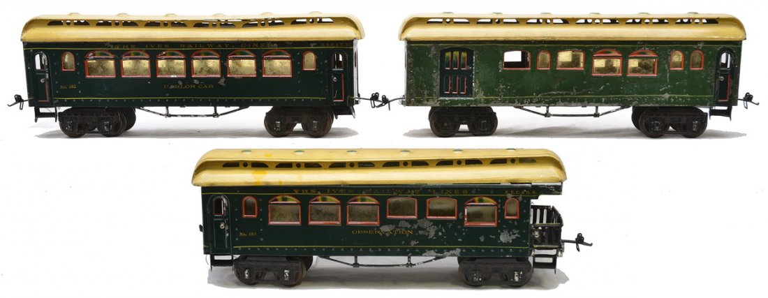 Ives Prewar 1 Ga Green 181 182 183 Cars: Ives prewar I gauge dark green passenger cars with mustard roofs including; 181 Buffet car, 182 Parlor and 183 Observation. The cars are lettered THE IVES RAILWAY LINES above the windows. The windows 
