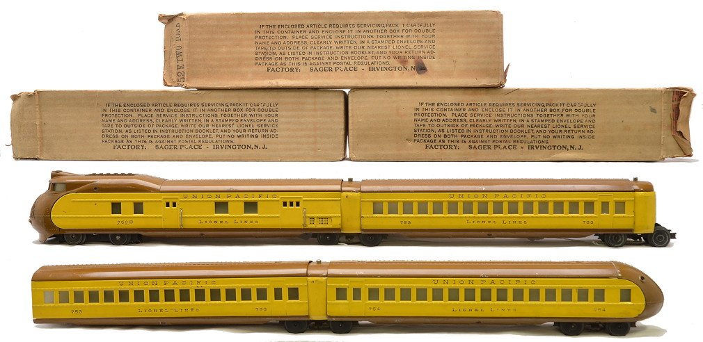 Lionel Yellow/Brown UP 752E 753 753 754: Lionel prewar O gauge yellow and brown Union Pacific streamliner passenger set no. 751E in individual OBs consisting of a 752E power car, 753 coach, 754 observation and two vestibules . Also included 