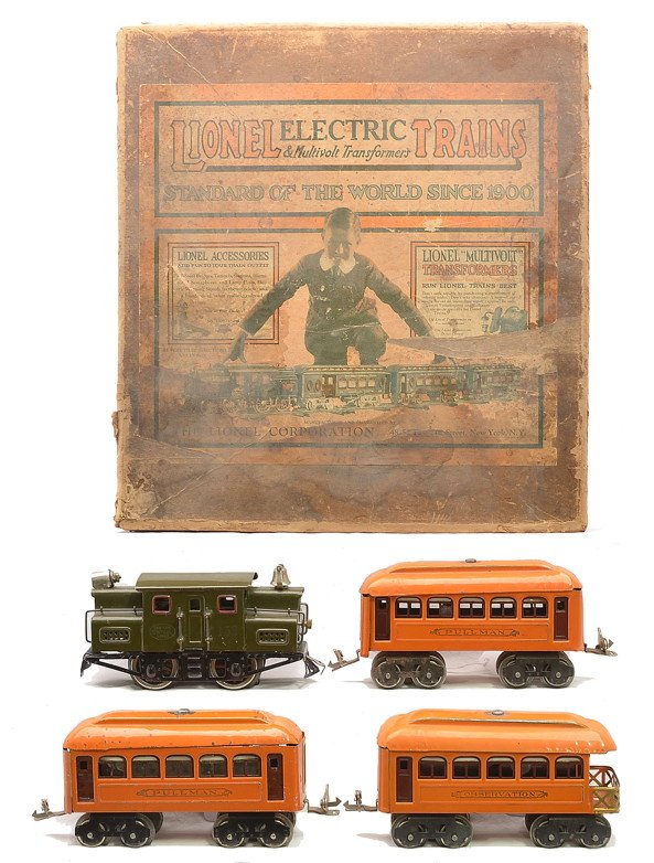 Lionel Pass Set no. 96 153 2-603 604 Boxed: Lionel prewar O gauge passenger set no. 96 circa 1925 including; 153 dark green electric loco rubber-stamped NEW YORK CENTRAL LINES, two 603 orange Pullmans one with wood grain inserts and one with ma