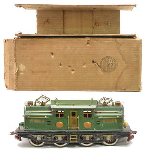 Scarce Lionel 408E Uncataloged State Gr Loco: Lionel prewar standard gauge uncataloged 408E electric loco in State car dark green with red pilots. The loco has red lettered brass plates and brass trim in OB that has an original cardboard insert.