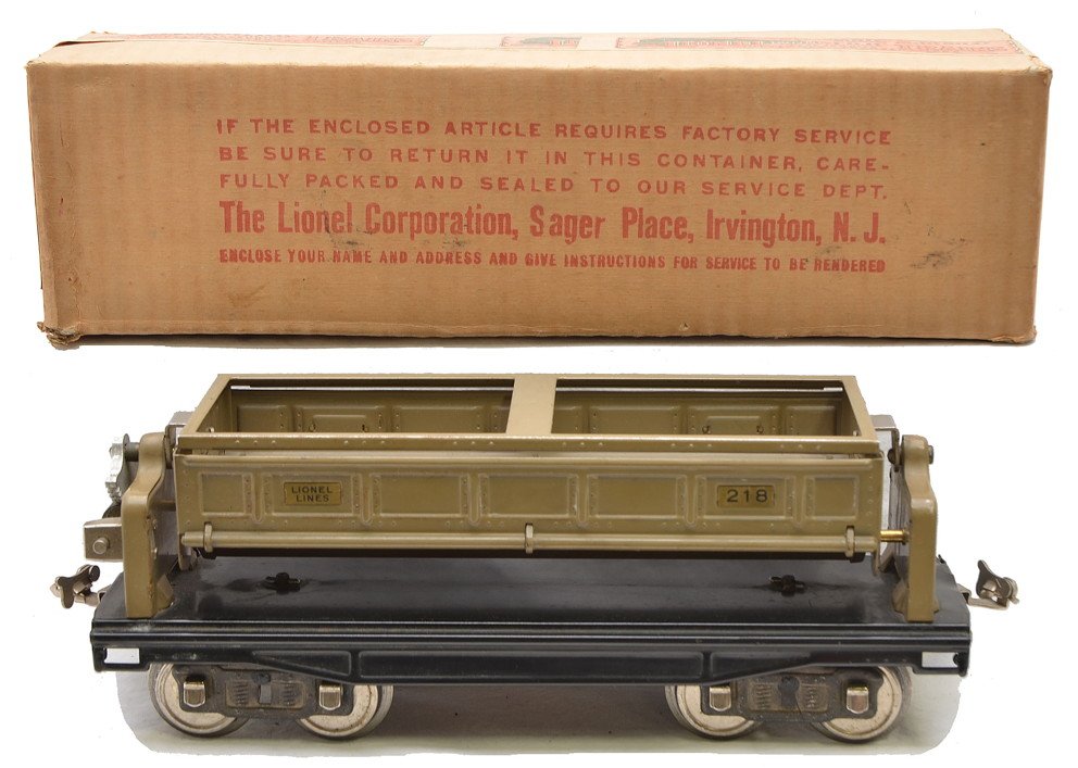 Lionel 218 Mojave Dump Car w/Painted Ends OB: Lionel prewar standard gauge 218 Mojave dump with single brass knob, painted ends, black lettered brass plates and nickel journals in OB, C8. Box is square and clean and has a clean label fully intact