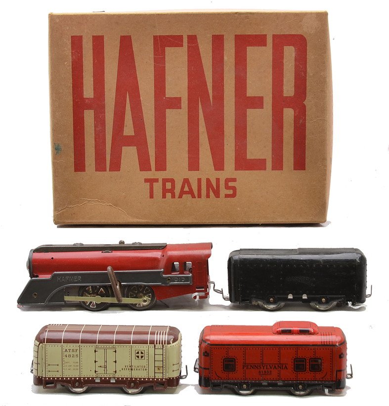 Lionel Prewar Lithographed Freight Set no. 90: Hafner prewar O gauge lithographed freight set no. 90 in set box with original cardboard insert including; 1010 red clockwork steam outline loco with dark gray side boards and boiler front, black four