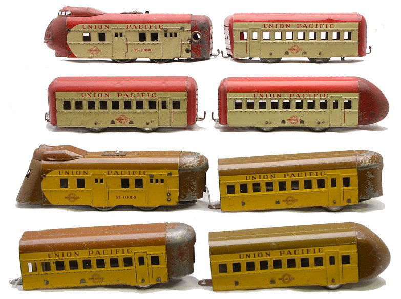Hafner Yellow/Br. UP Red/Cr. UP Pass Sets: Hafner prewar O gauge lithographed yellow and brown Union Pacific streamliner passenger set including: M-10000 clockwork power car, two coaches and an observation car. Also included is a lithographed