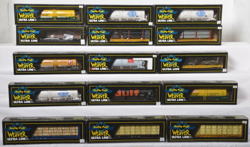 15 Weaver freight cars 4103, 1310, 4507, etc: Weaver modern O gauge freight cars in OBs. Fifteen freight cars include 2520L New Haven flat, 4107 Chicago and Northwestern flat, 4103 Union Pacific flat, 2712 Grand Trunk flat, 2527L Army flat, 68002