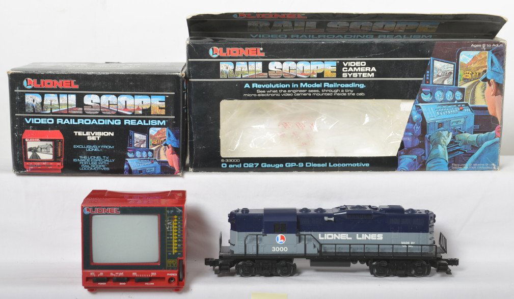 Lionel Railscope GP-9 and TV: Lionel modern O gauge Rail Scope video camera system 33000 GP9 diesel loco and a 33002 television set both in OBs. The diesel and TV are both complete and C8 condition. Both OBs have some moderate wea