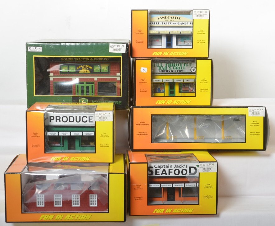 8 Railking buildings John Deere, bus stop, etc: MTH Railking modern O gauge buildings in OBs. Eight buildings include 90145 John Deere dealership, 9071 bus stop, 90038 Capt. Jacks seafood, 90097 Salt Water Taffy shop, 90262 Maple Doughnuts add on f