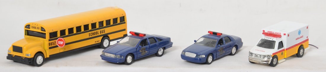 4 fully lighted 1/43rd vehicles: Four 1/43rd fully lighted vehicles. Includes two Michigan state police, school bus, and ambulance. These vehicles features flashing light bars, head lights, and tail lights. These regularly sell for 8