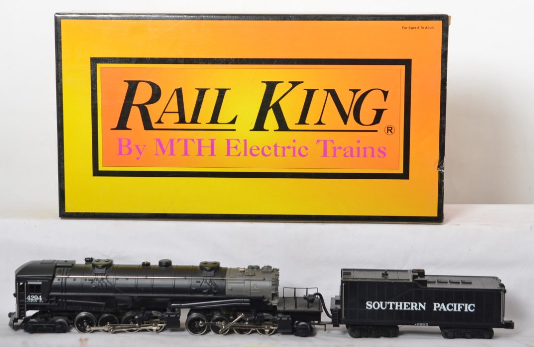 Railking Southern Pacific AC12 Cab Forward: Railking 30-1144-1 Southern Pacific AC12 Cab Forward in OB. Loco features Protosounds, Protocoupler, Smoke, and more. Loco is C8 condition with run time. Locomotive has also been upgraded with a BCR b