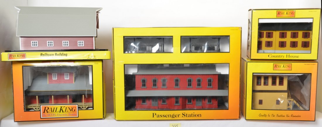 5 Railking buildings barn, houses, switch tower , etc: MTH Railking modern O gauge buildings in OBs. Includes 9015 country house, 90273 transfer warehouse, 9014 passenger station with platforms, 9031 Pennsylvania switch tower, and 9072 red barn. Building 