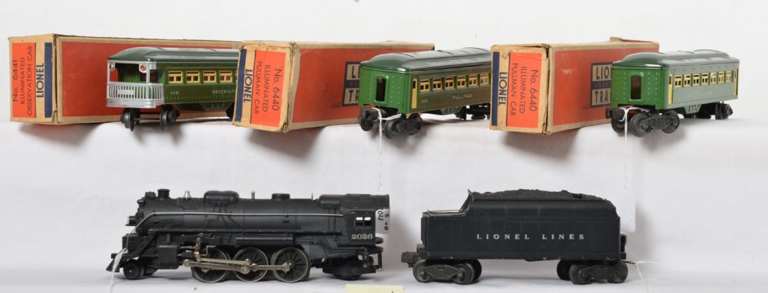 Lionel 2026/6466WX with two 6440 and 6441: Postwar Lionel O gauge 2026 steam locomotive with 6466WX whistle tender with two 6440 Pullman coaches, and 6441 observation, C6-7. Two 6440 and a 6441 original box included missing flaps.
