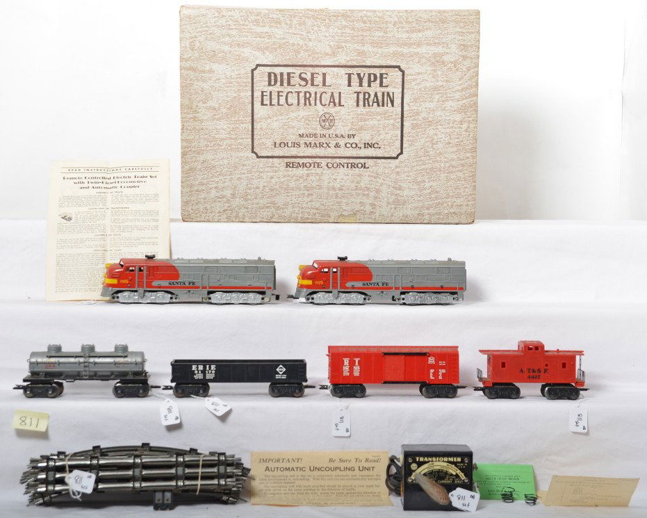 Marx 44874 Santa Fe diesel freight set in OB: Postwar Marx O gauge 44874 Santa Fe twin diesel remote control electric train freight set in original box. Set is comprised of: 1095 diesel A units (one horn is glue repaired), 51170 Erie gondola, 147