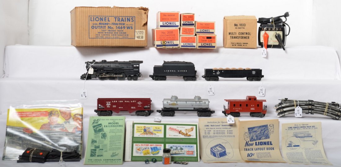 Lionel No. 1469 WS freight train set w/2035/6466W in OB: Postwar Lionel O gauge Outfit No. 1469 WS freight train with whistle and smoke. 2035 steam loco, 6466W whistle tender, 6465 Sunoco tank, 6456 Lehigh Valley hopper, 6462 New York Central gondola, 6257 