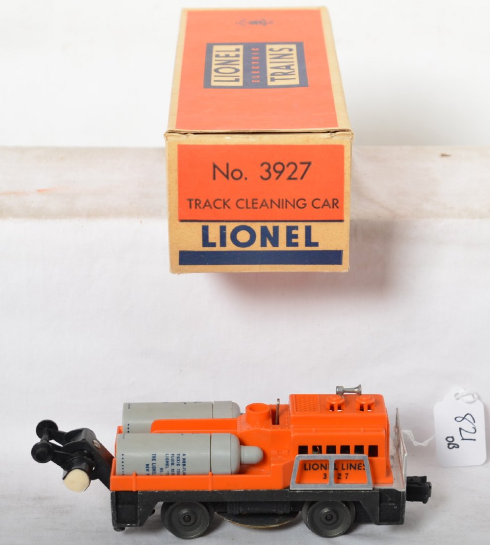 Lionel 3927 Track Cleaning car in OB: Lionel Postwar O gauge 3927 track cleaning car in OB. Car is C7+ with light play wear and original bottles. Also includes extra wipes. OB has all flaps attached, includes insert, has notice tag, and a