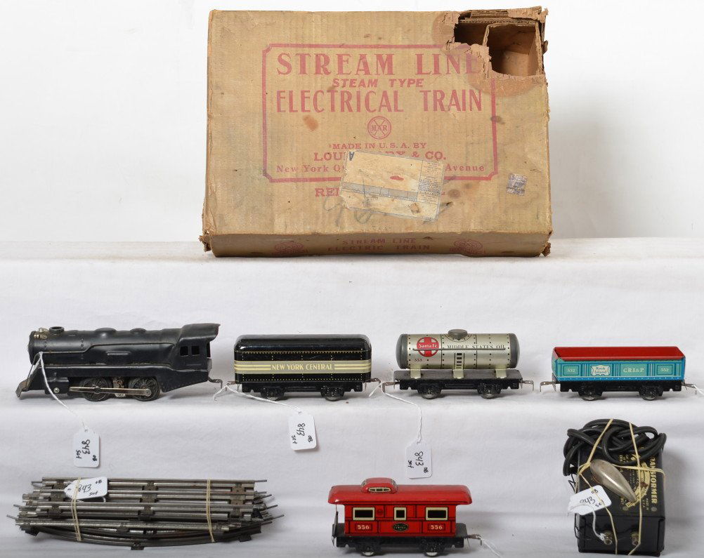 Marx 8994 streamline steam type electrical freight in: Marx O gauge No. 8994 streamline steam type electrical freight train set in original box. Set is comprised of: 898 tinplate loco and New York Central tinplate tender, 552 Rock Island gondola, 553 Sant