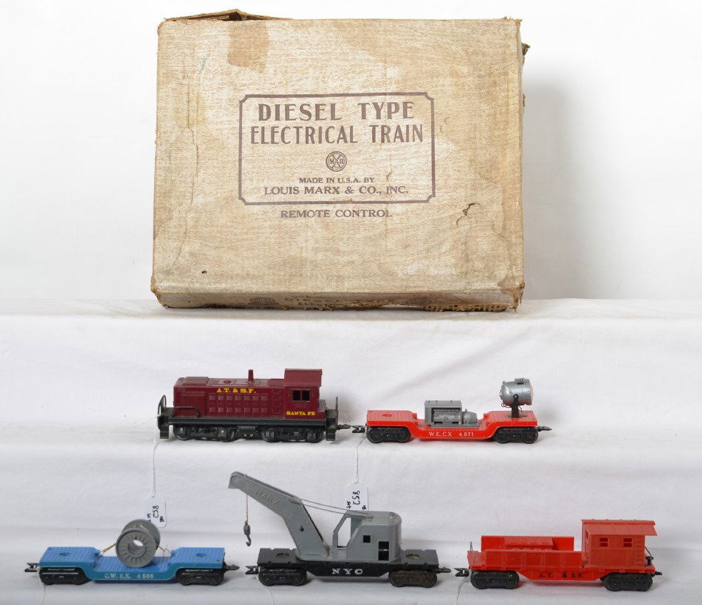 Marx No. 33922 A.T.&S.F. Diesel Type freight set in OB: Postwar Marx O gauge No. 33922 Diesel Type Electrical Train set in original box with 1998 A.T.S.F. switcher, 4566 C.W.E.X. depressed center flatcar w/cable reel, NYC operating work crane, 4571 W.E.C.X