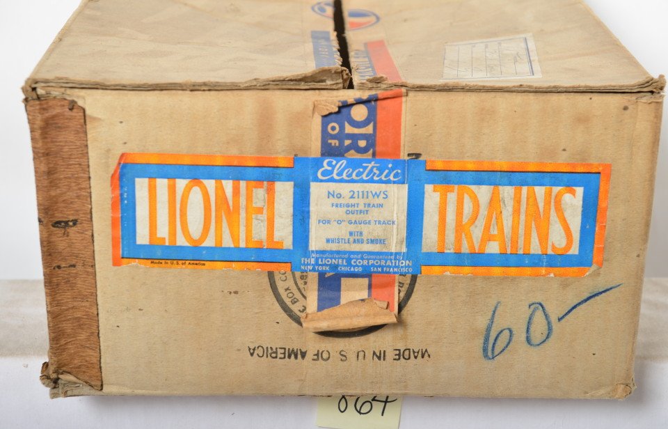 Lionel No. 2111WS freight train w/whistle and smoke OB: Postwar Lionel O gauge No. 2111WS set box only. Set was comprised of: 671/2466W, 3459, 2411, 2460, 2420, and components. Box has tear to an outer flap, otherwise very square and solid with very light 