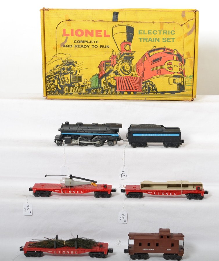 Lionel No. 1613S Steam Type Freight Set w/Smoke in OB: Postwar Lionel O gauge No. 1613 Steam Type Freight Set with Smoke in original boxes. Set is comprised of: 247 Baltimore and Ohio blue striped steam loco and tender with 6819 flatcar with helicopter (m