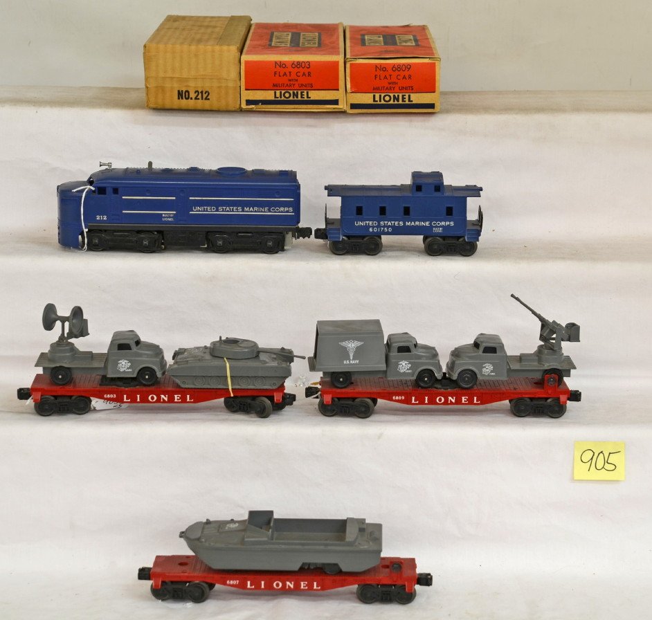 Lionel 212P, 6803, 6807, 6809, and 6017-50: Postwar Lionel O gauge 212P United States Marine Corps Alco diesel A unit with 6803 flat w/military vehicles, 6807 flat with amphibian DUCK, 6809 flat w/military vehicles, and 6017-50 USMC caboose, C6