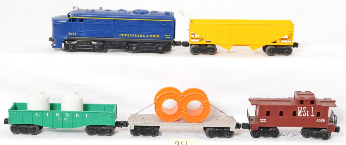 Lionel 2024, 6176, 6142, 6402, 6059 C&O diesel freight: Postwar Lionel O gauge 2024 Chesapeake and Ohio Alco diesel A unit with 6176 undecorated yellow hopper, 6142 canister car with two white canisters, 6402 undecorated General-type flat with two cable re