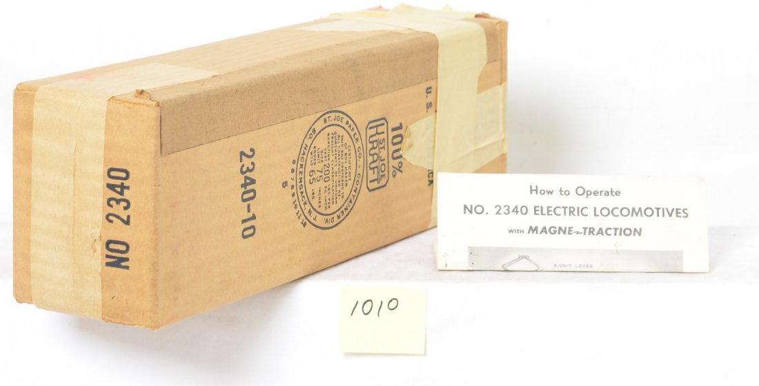 Lionel original box for 2340-10 GG1: Lionel postwar O gauge original box only for 2340-10 tuscan GG1, the box is actually a pretty nice but does have masking tape on one end, not to hold flaps on but maybe to keep it closed? Factory seal
