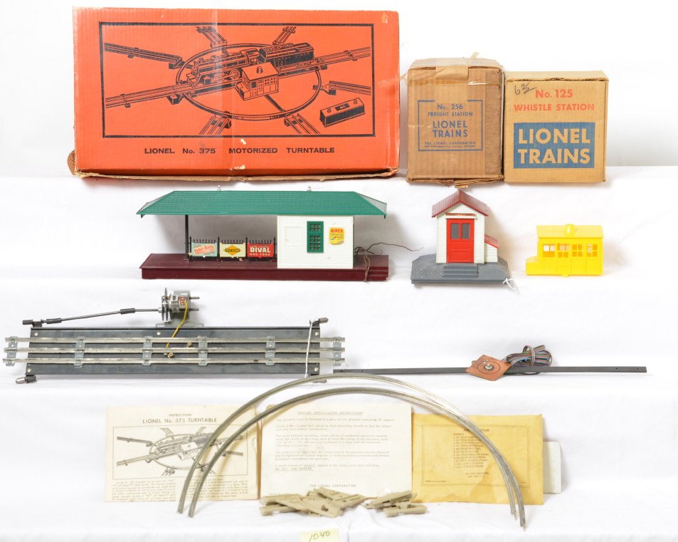 Lionel 125, 256, 375 operating accessories in OB: Postwar Lionel 125 whistle station, 256 freight station, and 375 motorized turntable. This is a General Condition lot, meaning we have not examined or graded every item in the lot so the condition wil