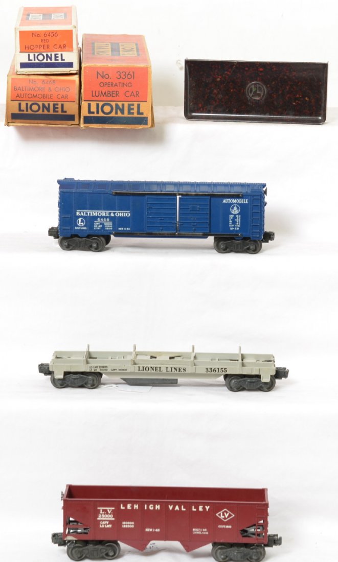 Lionel 3361 lumber, 6456 LV hopper, 6468 boxcar in OB: Postwar Lionel O gauge 3361 operating lumber car, 6456 red LV hopper, and 6468 Baltimore and Ohio double doors automobiles boxcar. Trains look C6-7. 160 bin is very nicely mottled, but cracked. Boxes