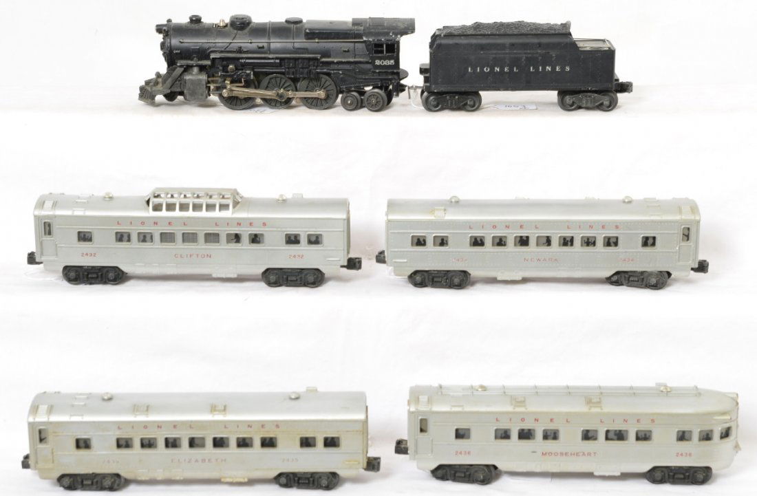 Lionel 2035, 2432, 2435, 2434, 2436: Lionel Postwar O gauge trains including 2035 steam locomotive, Lionel Lines whistle tender, 2432 Clifton vista dome, 2435 Elizabeth coach, 2434 Newark coach, and 2436 Mooseheart observation. This is a