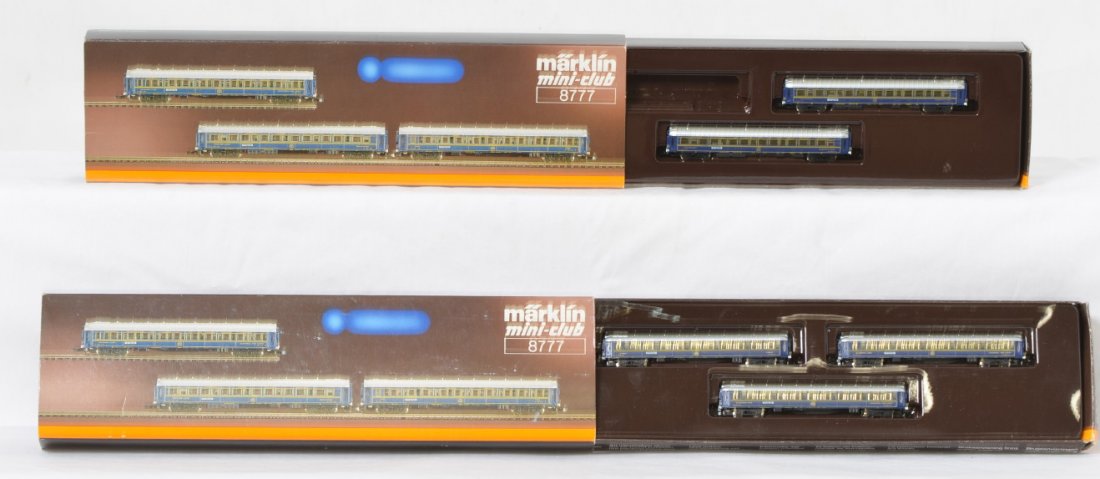 Marklin Orient Express Z gauge sleeper sets: Marklin Z gauge Orient Express 8777 sleeper car sets. One set is complete, one set missing one car. Otherwise sets are C8+. OBs have some very light wear. Cars match set in lot 1124.